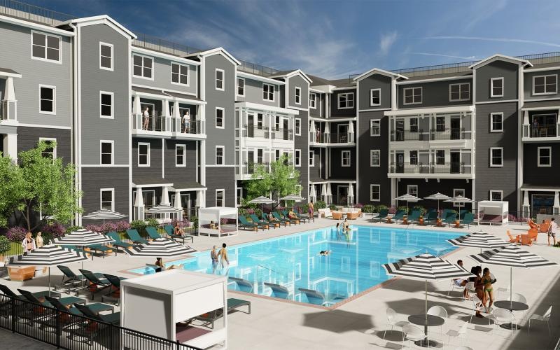 a swimming pool in front of a large building