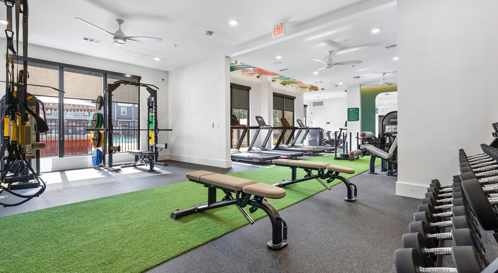 a gym with treadmills