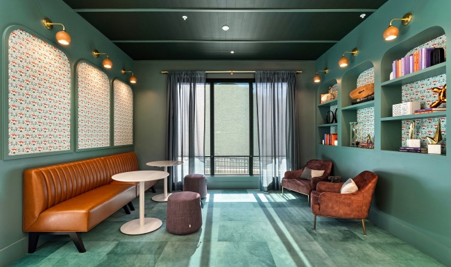 A room with chairs and a couch
