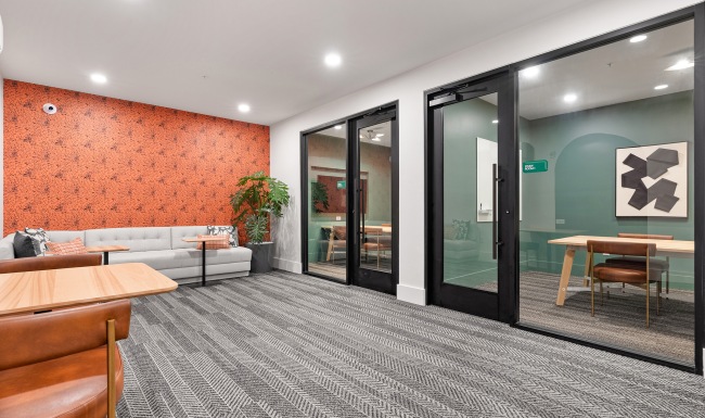 A room with chairs and a couch