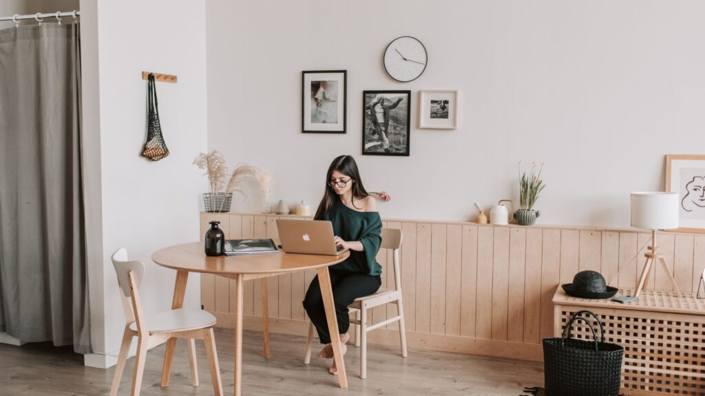 student at her desk in her student apartment